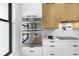 Modern kitchen featuring built-in double ovens, sleek countertops, and stylish cabinetry at 101 W Warren Ave # 1, Tampa, FL 33602
