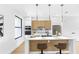 Bright kitchen features modern appliances, a center island with seating and beautiful pendant lighting at 101 W Warren Ave # 1, Tampa, FL 33602