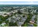An aerial view of the neighborhood highlights meticulously maintained homes and verdant landscaping at 11722 Currie Ln # G1, Largo, FL 33774
