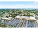 Aerial view highlighting property location near local stores and with easy parking accessibility at 11722 Currie Ln # G1, Largo, FL 33774