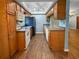 Traditional kitchen with updated appliances and ample counter space at 11722 Currie Ln # G1, Largo, FL 33774