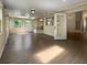 Sunroom with tile flooring and natural light streaming through the windows at 11722 Currie Ln # G1, Largo, FL 33774