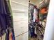 Organized walk-in closet with clothing racks, shelves, and drawers, maximizing storage space in this home at 11722 Currie Ln # G1, Largo, FL 33774