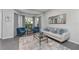 Comfortable living room with stylish furniture, neutral colors, and natural light at 12956 Royal George Ave, Odessa, FL 33556