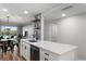 Updated kitchen featuring an island with an open view to the dining and living area at 1324 Pasadena S Ave # 204, South Pasadena, FL 33707