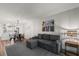 Open-concept living room featuring hardwood floors and modern decor at 1324 Pasadena S Ave # 204, South Pasadena, FL 33707
