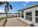 Backyard with a patio, and view of the lake at 1518 New Bedford Dr, Sun City Center, FL 33573