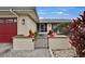 Welcoming front entrance with gated courtyard and well-kept landscaping at 1518 New Bedford Dr, Sun City Center, FL 33573