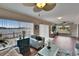 Open-concept living area offering serene water views, comfortable seating, and stylish décor at 1518 New Bedford Dr, Sun City Center, FL 33573