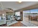 Comfortable living room with water view from large sliding glass doors at 1518 New Bedford Dr, Sun City Center, FL 33573