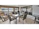 Enclosed lanai with plenty of seating overlooking the water at 1518 New Bedford Dr, Sun City Center, FL 33573