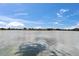 Beautiful water view from the backyard, creating a peaceful and serene atmosphere at 1518 New Bedford Dr, Sun City Center, FL 33573