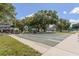 Enjoy the shuffleboard courts surrounded by mature trees and beautiful landscaping at 2100 World Parkway Blvd # 30, Clearwater, FL 33763