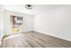 Bright bedroom with a large window and light wood floors at 2101 Cordova Grn, Seminole, FL 33777