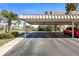Spacious carport featuring ample parking and convenient access to nearby townhouses at 2101 Cordova Grn, Seminole, FL 33777