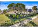 Attractive exterior view of this cozy townhouse with lush green lawns and landscaping at 2101 Cordova Grn, Seminole, FL 33777