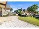 Charming townhouse with lush landscaping, well-manicured lawn, and tiled patio at 2101 Cordova Grn, Seminole, FL 33777