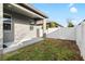A backyard featuring a cozy covered patio at 219 Villa Luna Ln, Lutz, FL 33549