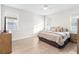 Inviting bedroom with ample natural light, neutral tones, and comfortable furnishings at 219 Villa Luna Ln, Lutz, FL 33549