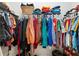 Organized walk-in closet with ample storage space for clothing, shoes, and accessories at 219 Villa Luna Ln, Lutz, FL 33549