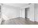 Bright bedroom featuring neutral paint, modern baseboards and light colored flooring at 2535 E Stanley Matthew Cir, Tampa, FL 33604