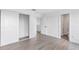 Bright bedroom featuring neutral paint, modern baseboards, large closet and ensuite bathroom at 2535 E Stanley Matthew Cir, Tampa, FL 33604