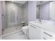 Modern bathroom featuring a glass-enclosed shower, floating vanity, and minimalist design at 301 1St S St # 3103, St Petersburg, FL 33701