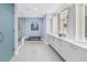 Modern bathroom showcasing double vanity with white countertop, glass shower, and contemporary design at 301 1St S St # 3103, St Petersburg, FL 33701