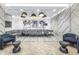 Modern conference room featuring stylish decor, light fixtures, and abstract art at 301 1St S St # 3103, St Petersburg, FL 33701