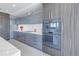 Gourmet kitchen with custom cabinets, stainless steel appliances, and a breakfast bar at 301 1St S St # 3103, St Petersburg, FL 33701