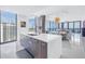 Bright, modern kitchen with an island and an open floor plan offering stunning views at 301 1St S St # 3103, St Petersburg, FL 33701