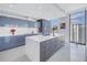 Beautiful kitchen with an island, custom cabinets, quartz counters, and a view at 301 1St S St # 3103, St Petersburg, FL 33701