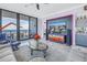 The living room has sliding glass doors with exterior views, comfortable seating, and a modern aesthetic at 301 1St S St # 3103, St Petersburg, FL 33701