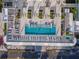 Stunning rooftop pool area with inviting lounge chairs and palm trees at 301 1St S St # 3103, St Petersburg, FL 33701