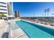 Relaxing rooftop pool area with comfortable lounge chairs and skyline views at 301 1St S St # 3103, St Petersburg, FL 33701
