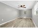Bedroom with modern floors and a ceiling fan at 304 David Ave, Clearwater, FL 33759