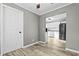 Dining room with modern floors and adjacent kitchen at 304 David Ave, Clearwater, FL 33759