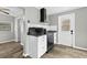 Cozy kitchen featuring stainless steel appliances, granite countertops, and modern cabinetry at 304 David Ave, Clearwater, FL 33759