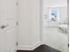 Light-filled doorway entering bedroom with white desk and sheer curtains at 3280 Juniper Springs St, Wesley Chapel, FL 33543