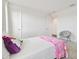 Bedroom with white walls, two doors, white trim and plush neutral carpeting at 3280 Juniper Springs St, Wesley Chapel, FL 33543