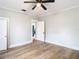 Bedroom featuring wood-look flooring, and a ceiling fan at 3406 E 29Th Ave, Tampa, FL 33605