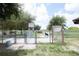 A well-maintained dog park with separate areas for small and large dogs at 3857 Sailmaker Ln, Holiday, FL 34691