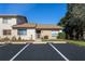 Charming single-story condo with assigned parking and well-maintained landscaping at 3857 Sailmaker Ln, Holiday, FL 34691