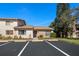 Well-maintained condo exterior with easy parking and landscaping at 3857 Sailmaker Ln, Holiday, FL 34691