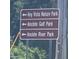 Sign indicating the location of Key Vista Nature Park, Anclote Gulf Park, and Anclote River Park at 3857 Sailmaker Ln, Holiday, FL 34691