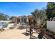 The pool area has lounge chairs for residents to relax and enjoy the sunshine at 3857 Sailmaker Ln, Holiday, FL 34691