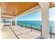 Wide balcony features unobstructed views of the ocean and a metal railing at 4005 Casey Key Rd, Nokomis, FL 34275