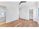 Clean bedroom with hardwood floors, leading to a walk-in closet and bathroom at 4005 Casey Key Rd, Nokomis, FL 34275