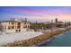 Beautiful beachfront home with large windows and multiple balconies with direct ocean access at 4005 Casey Key Rd, Nokomis, FL 34275