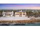 Coastal home with a sandy beachfront and panoramic ocean views, perfect for seaside living at 4005 Casey Key Rd, Nokomis, FL 34275
